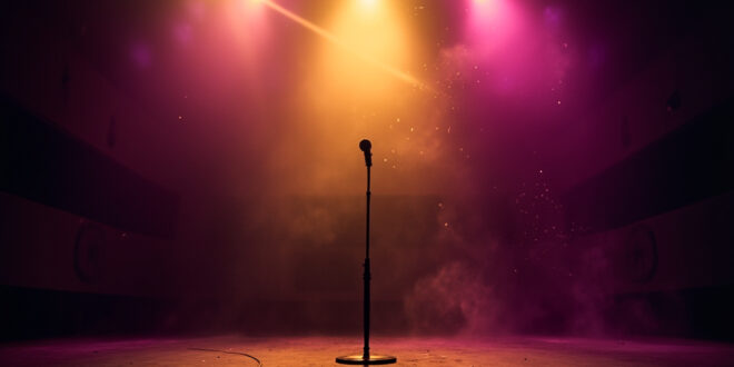 Empty concert stage with lone microphone stand illuminated by golden spotlight against deep purple background in abandoned hall