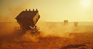 Abandoned military base with empty missile launch pad under attack in deserted desert compound