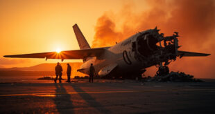 Abandoned aircraft wreckage with damaged wing on empty runway at dusk, metallic debris illuminated by fading light