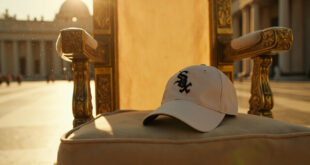 Chicago White Sox baseball cap resting on the ornate papal throne in an empty St. Peter's Square at the Vatican