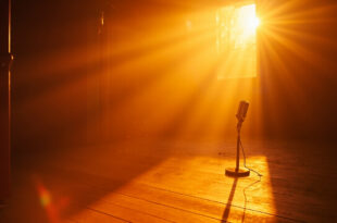 Vintage microphone stands alone in an abandoned recording studio bathed in golden sunset light, symbolizing music legacy