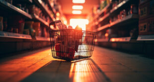 Empty shopping cart in abandoned grocery store aisle surrounded by floating price tags showing increasing food costs