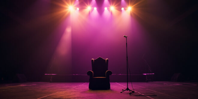 Empty throne beneath spotlight on dark stage with solitary microphone in abandoned concert venue at twilight