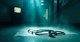 Empty hospital corridor with dramatic lighting, featuring stethoscope on abandoned medical chart in clinical white and blue