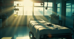 Empty hospital room with advanced medical equipment, surgical instruments, and monitoring systems in morning light