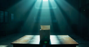 Sealed ballot box with cast votes sits on empty table in abandoned polling station after voting hours