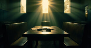 Empty courtroom at dawn with knife sheath and documents on evidence table, bathed in early morning light