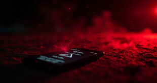 Abandoned smartphone displaying red warning notifications about online sextortion in a dark digital environment