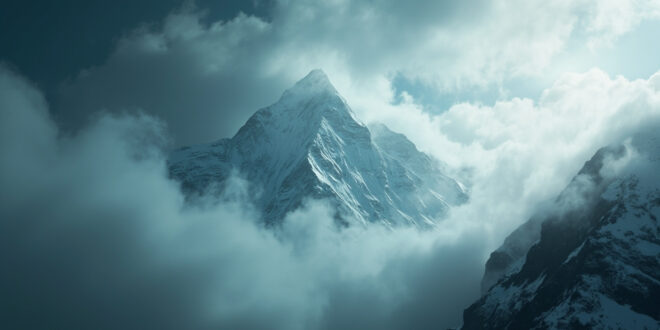 Towering Nanga Parbat mountain peak shrouded in mist and clouds against a stormy gray sky, capturing silent tragedy