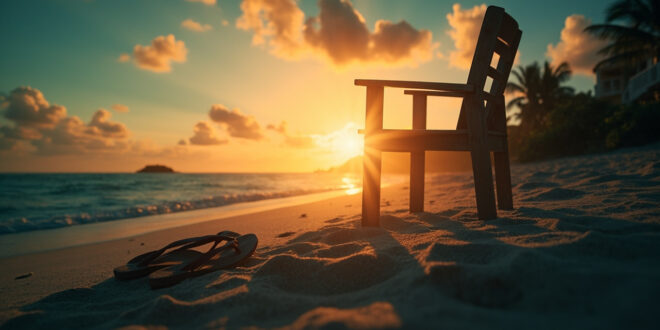 Empty beach chair faces the ocean at dawn with abandoned flip-flops nearby at a deserted tropical resort