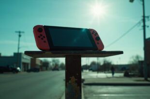 Abandoned Nintendo Switch perched on an empty parking sign in a deserted small-town parking lot at dusk