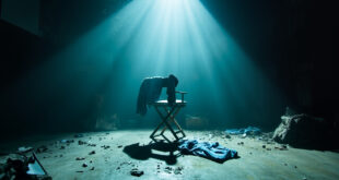 Abandoned television studio with blue jeans draped over empty director's chair amid scattered campaign materials