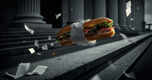 A submarine sandwich suspended in air above scattered legal documents near courthouse columns.