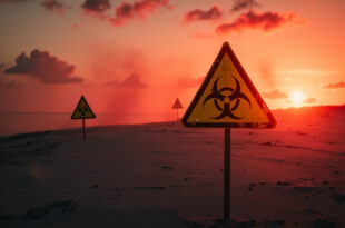 Biohazard warning signs scattered across a deserted Gulf Coast beach at dusk, marking a deadly bacteria outbreak area