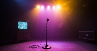 Abandoned television studio with dimmed lights, featuring a vintage microphone on empty stage and silent TV displaying static