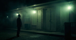 Solemn funeral home exterior at dawn with closed hearse doors during a crime investigation