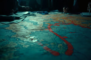 Strategic maps with territorial boundary markers and crossed-out buffer zone proposals on dark war room table surface