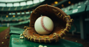 Close-up of brown leather baseball glove holding white baseball in stadium bleachers with scattered debris