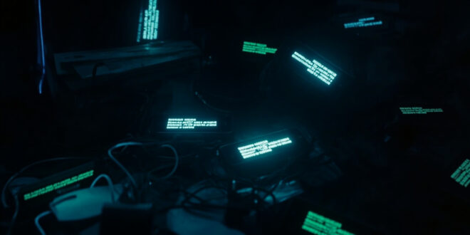 Dark room with glowing smartphone screens showing blocked numbers and message notifications on bed