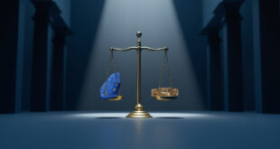 Golden scales of justice balancing EU flag against computer circuit board in formal government setting