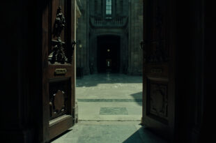 Ornate government office doors standing open with scattered official papers on polished floors