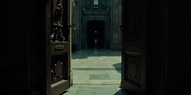 Ornate government office doors standing open with scattered official papers on polished floors