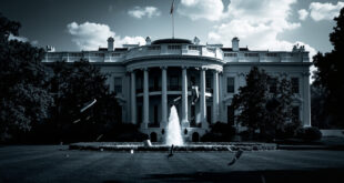 Open second-story White House window with dark objects scattered on lawn below against bulletproof glass