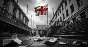 St Georges flag on pole outside modern council building with scattered papers on wet concrete ground