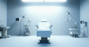 Empty medical examination chair in sterile healthcare room under fluorescent lighting