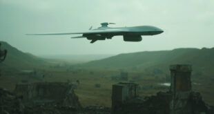 Military drone flies over empty battlefield with distant artillery positions on opposing hillsides