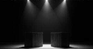 Two wooden podiums face each other under spotlights on dark stage with dramatic shadows and narrow gap between them