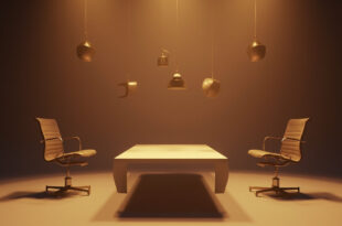 Television studio interview setup with two empty chairs and microphones under warm studio lighting.