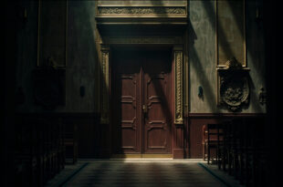 Closed ceremonial doors with official seals in a government building hallway