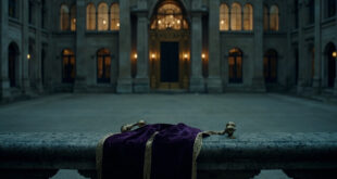 Empty royal lodge facade with closed doors and overgrown garden path leading to ornate gate