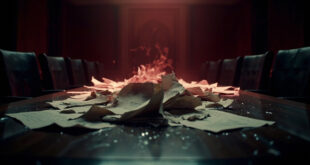 Scattered official documents with broken wax seals on dark wooden conference table in empty meeting room.