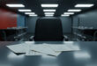 Empty government office desk with three appointment cards and vacant chairs under harsh overhead lighting