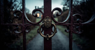 Ornate iron gates with royal crest closed against twilight sky, gravel path leading to distant mansion