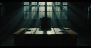 Empty executive chair behind wooden desk in government office with papers and laptop, symbolizing absence and loss